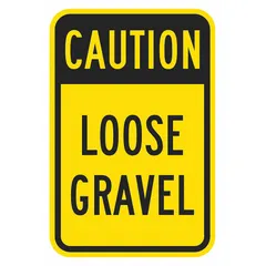 Aluminum sign with Engineer-grade retroreflective sheeting, nominal size 24 in x 18 in, 0.08 in thickness. Used to alert drivers of loose gravel on roadways, construction zones, or gravel surfaces.